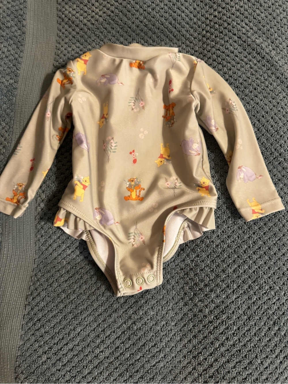 Disney Baby Winnie the Pooh Long-Sleeve One-Piece Rash Guard Swimsuit.